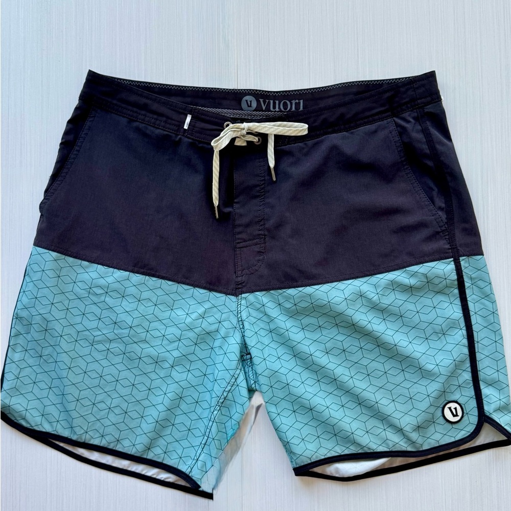 Vuori Two-Tone Black and Teal Geo Swim Board Shorts